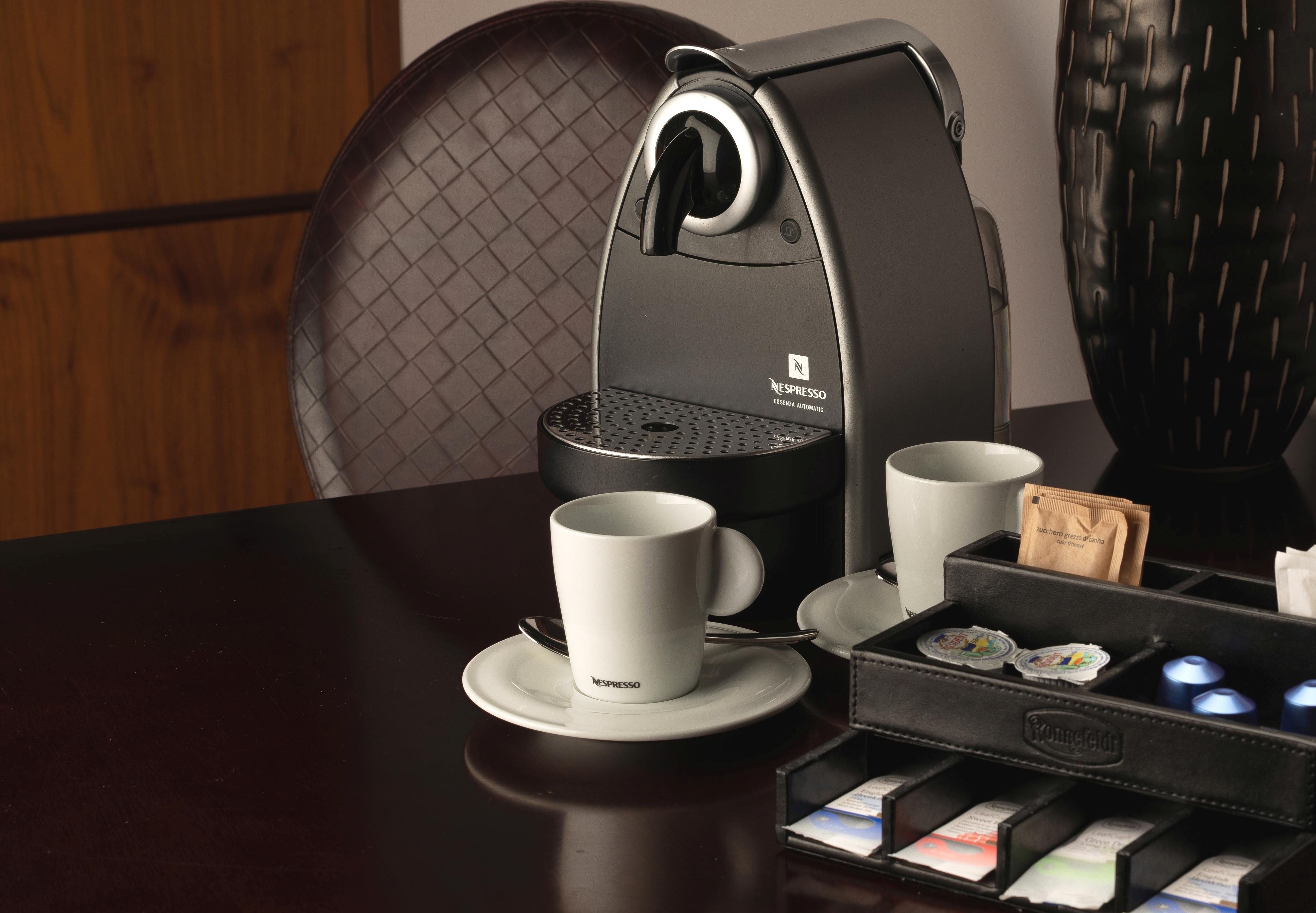 그랜드 마크 프라하 - 더 리딩 호텔 오브 월드 외부 사진 A Nespresso coffee machine